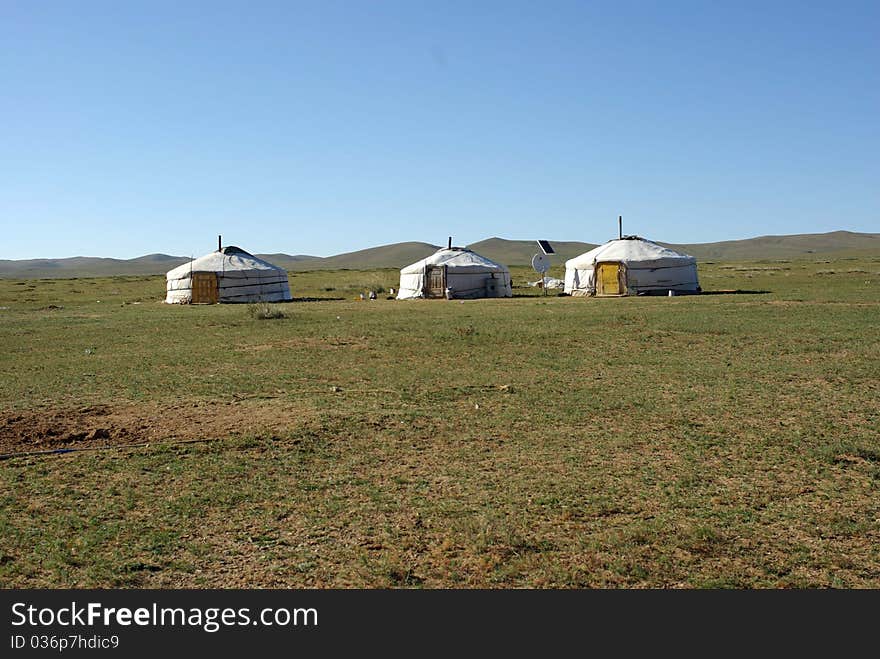 Yurts in the Mongolian steppe, in Asia. Yurts in the Mongolian steppe, in Asia