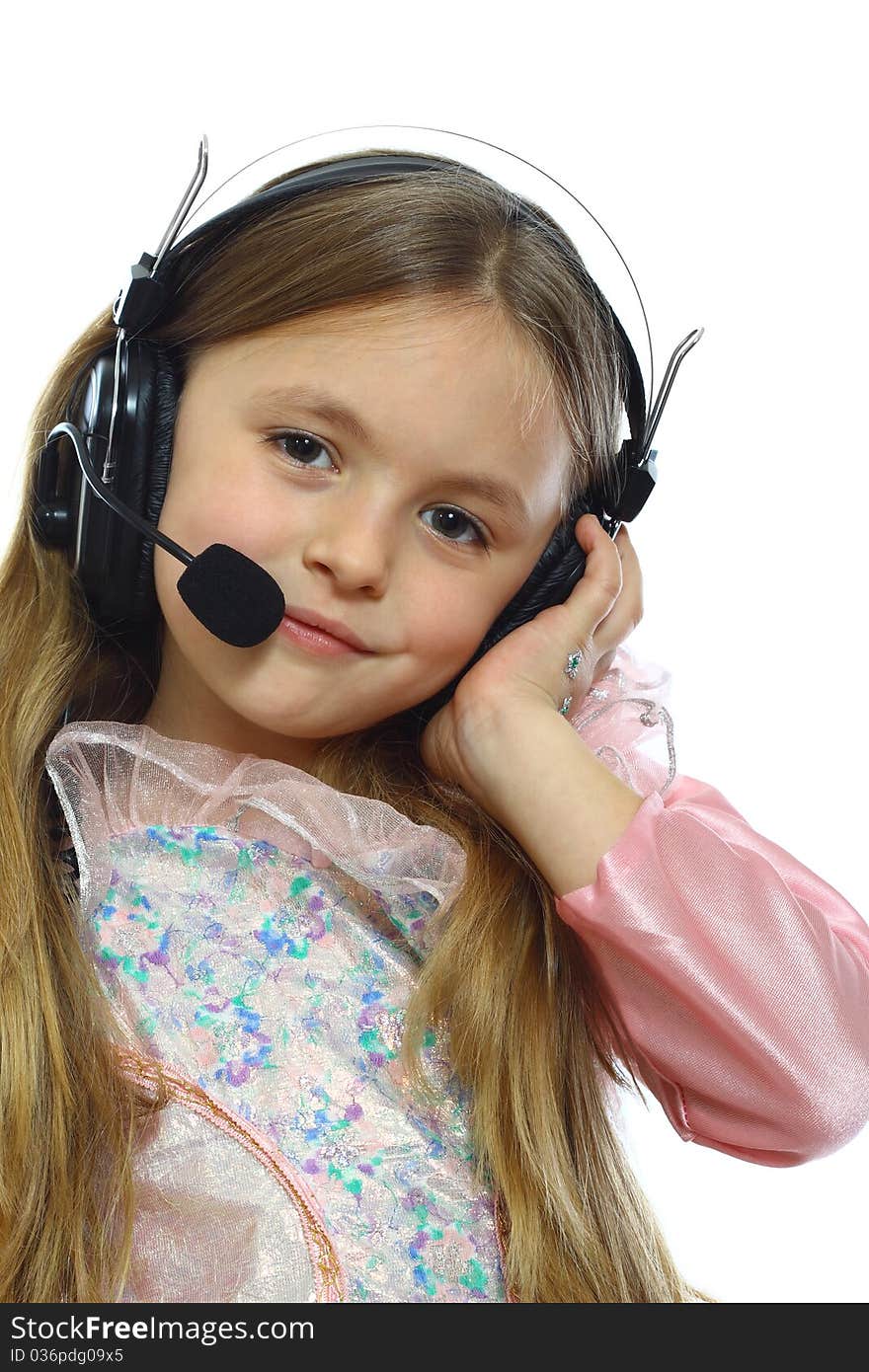 Cute little girl posing with headphones