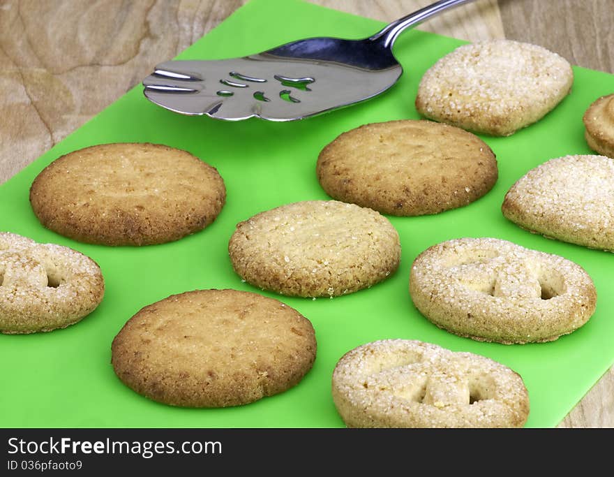 Fresh sugar cookies on green