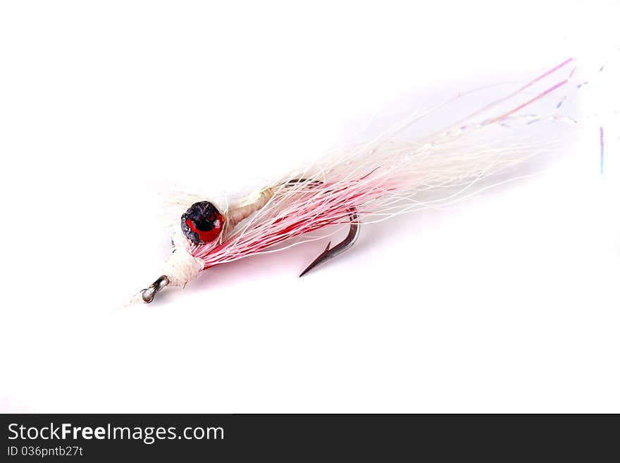 Deep Minnow style salt water fly isolated on a white background. Deep Minnow style salt water fly isolated on a white background