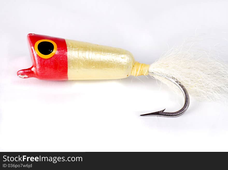 Red Popper salt water fly isolated on a white background. Red Popper salt water fly isolated on a white background