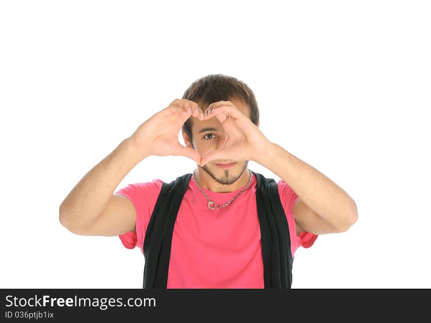 Young man shows heart symbol isolated in white