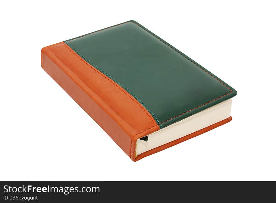 Closed notebook on white background