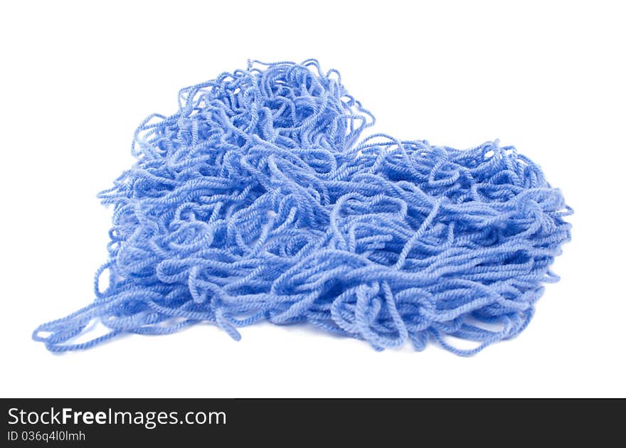 Blue yarn on white background