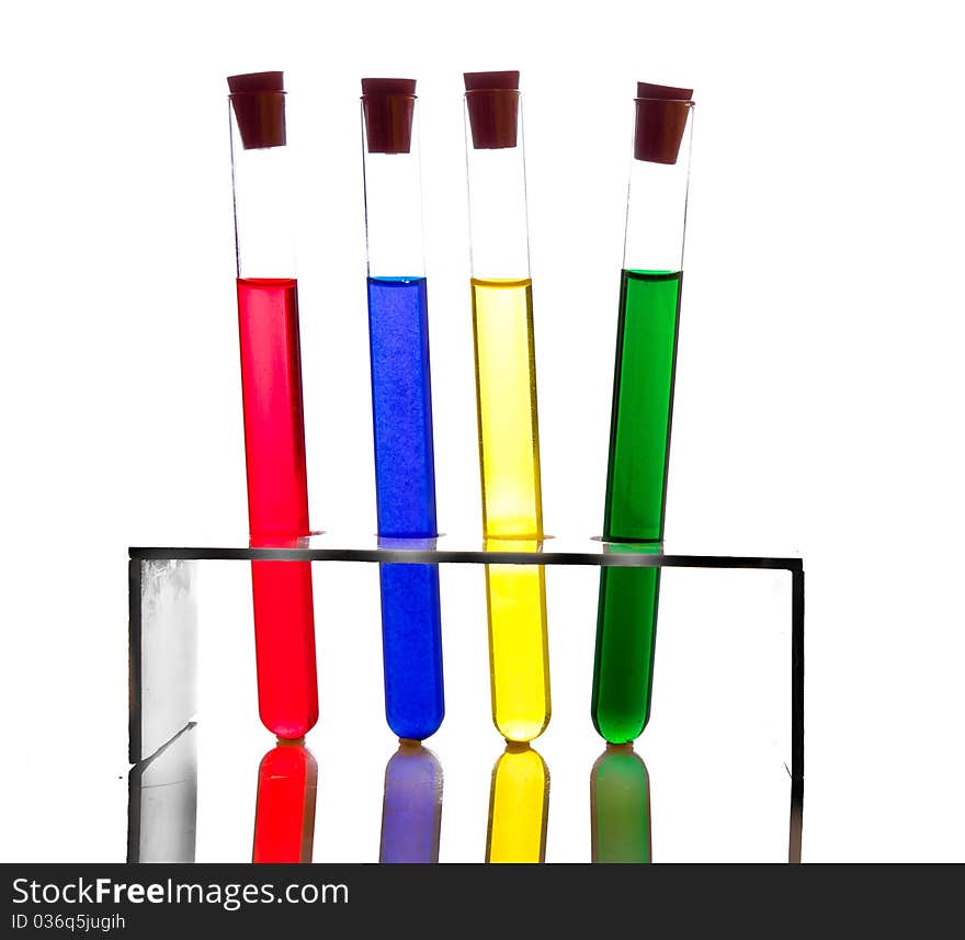 Labolatory glassware with colorful fluids isolated