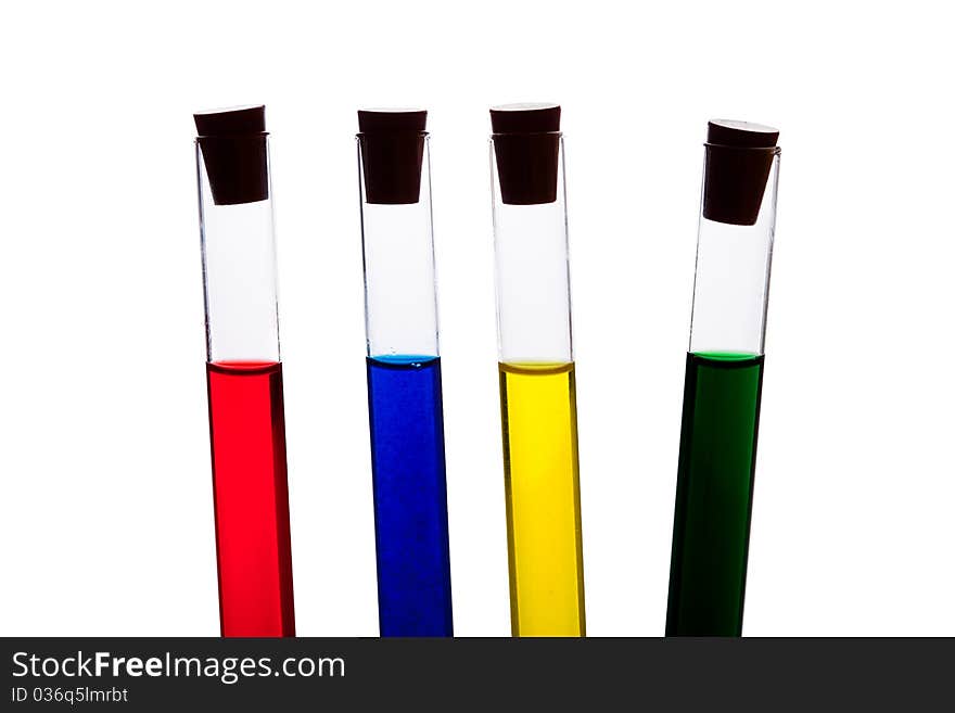 Labolatory glassware with colorful fluids isolated