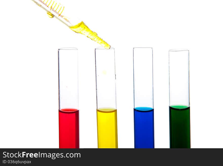 Labolatory glassware with colorful fluids isolated