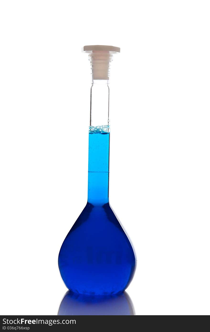 Labolatory glassware with colorful fluids isolated