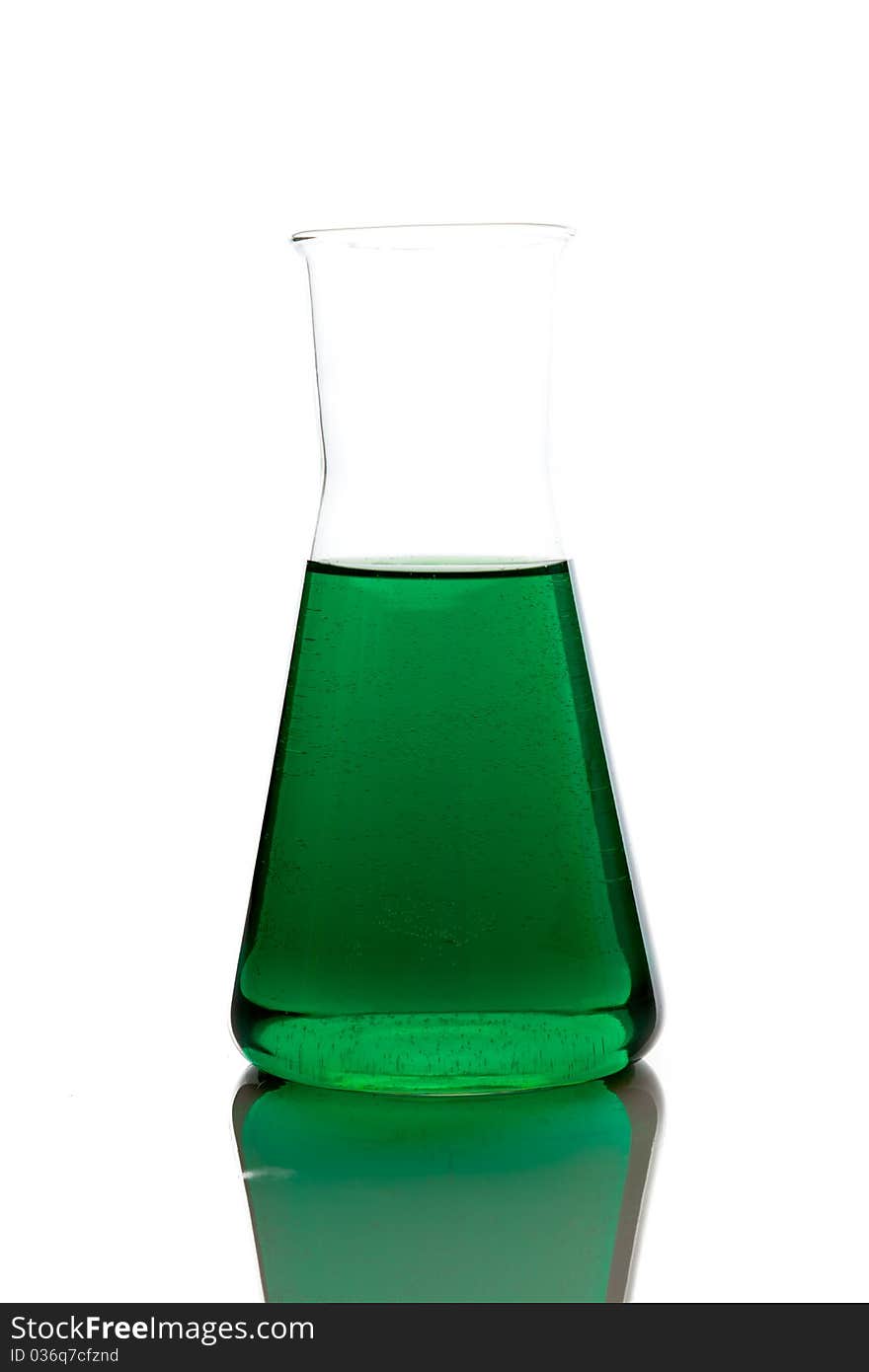 Labolatory glassware with colorful fluids isolated