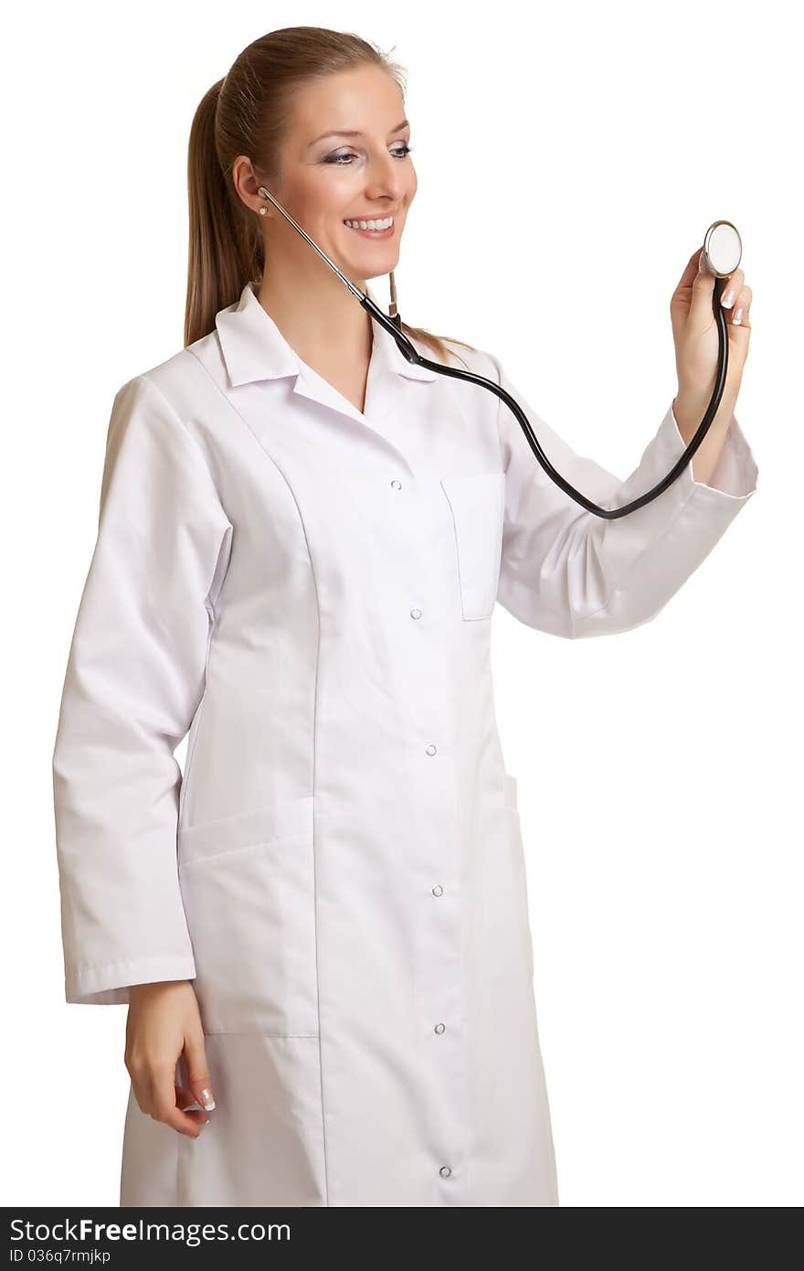 Medical doctor woman in uniform with stethoscope isolated on white. Medical doctor woman in uniform with stethoscope isolated on white