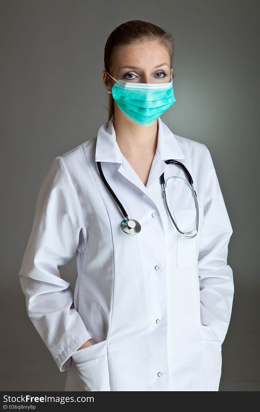 Medical doctor woman in uniform with stethoscope isolated on white. Medical doctor woman in uniform with stethoscope isolated on white