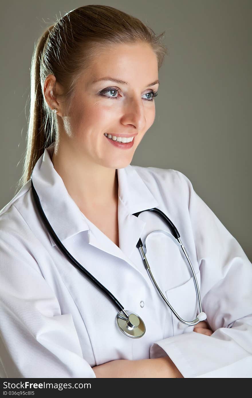 Medical doctor woman in uniform with stethoscope isolated on white. Medical doctor woman in uniform with stethoscope isolated on white