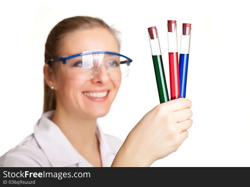 Isolated scientist woman in lab coat with chemical glassware