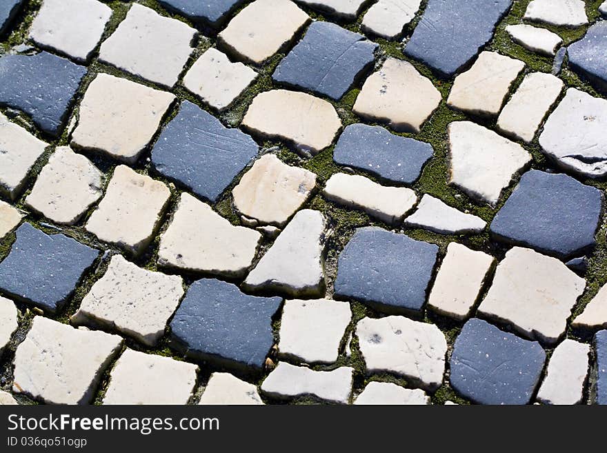 Pavement of black and white basalt