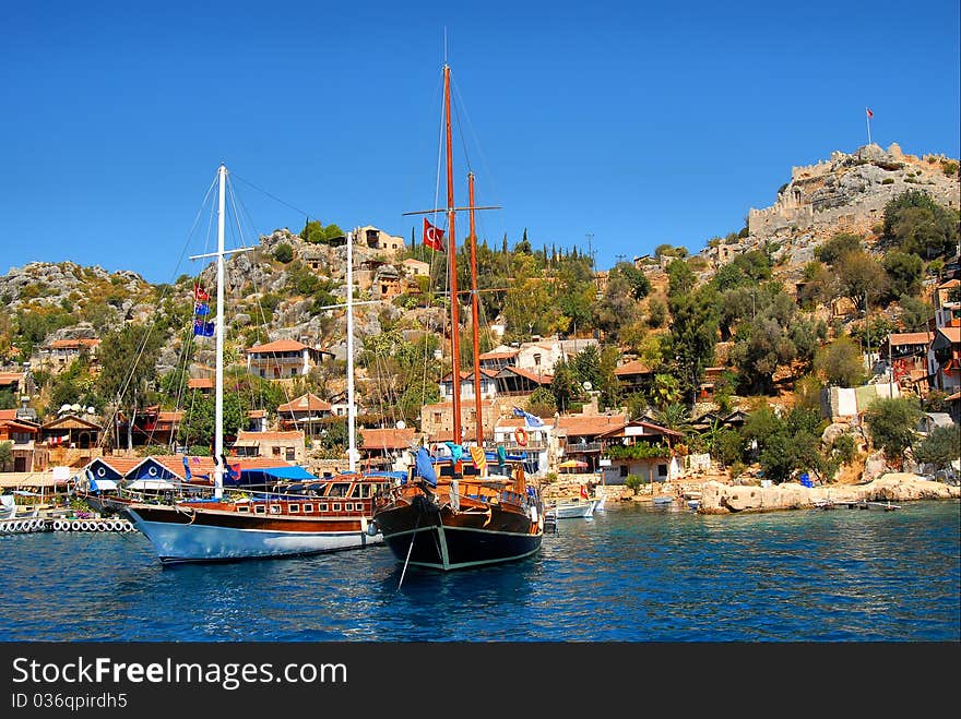 Ships moored at sea near the village. Ships moored at sea near the village