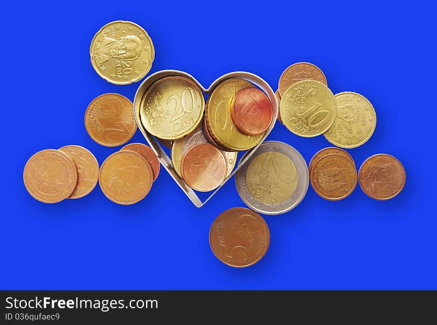 Coins isolated on the blue background with clipping paths. Coins isolated on the blue background with clipping paths.