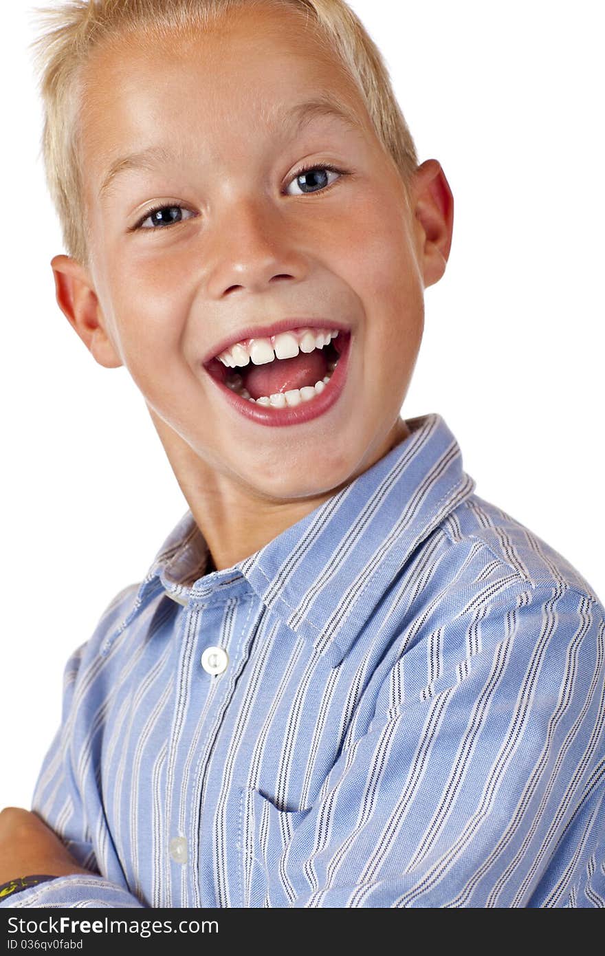 Portrait of young happy smiling boy. Isolated on white background.