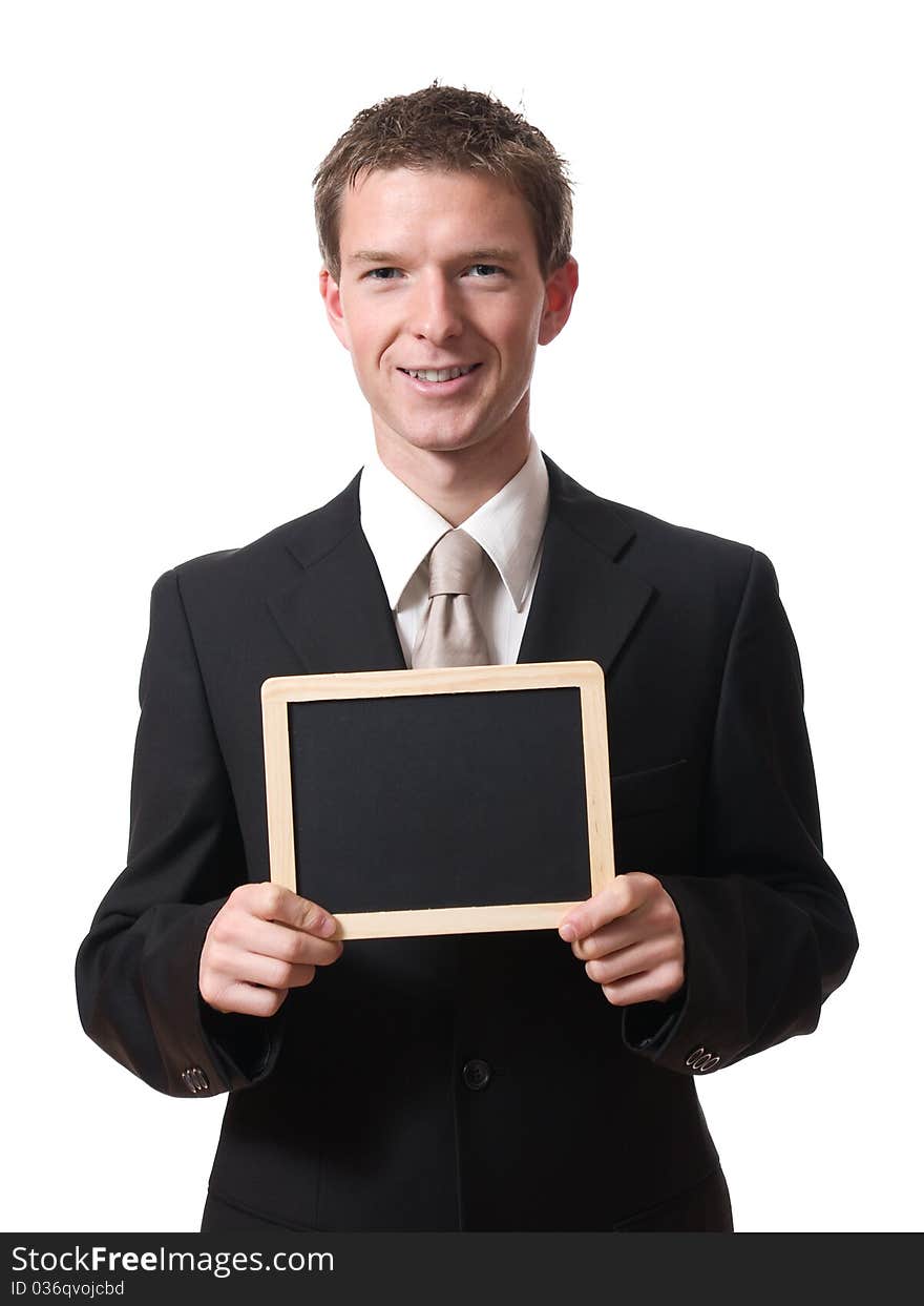 Businessman holding blackboard