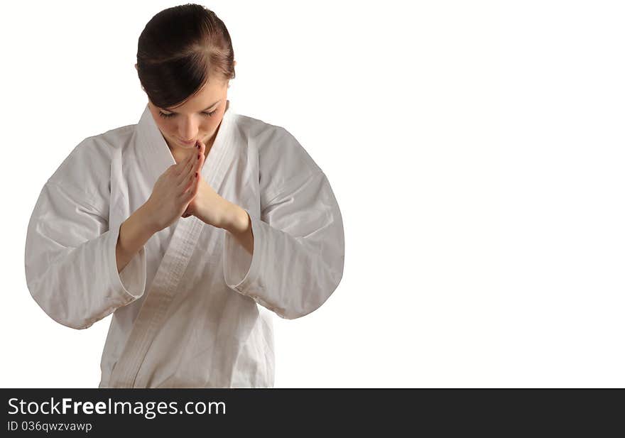 Young woman in kimono makes sign of greeting and respect