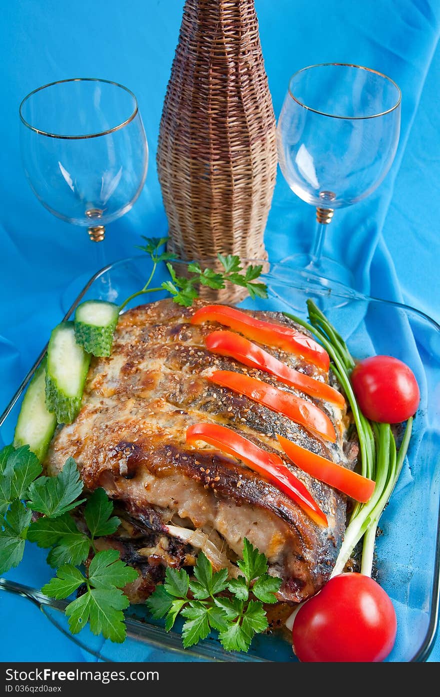 Fish baked in an oven and different vegetables. Fish baked in an oven and different vegetables.