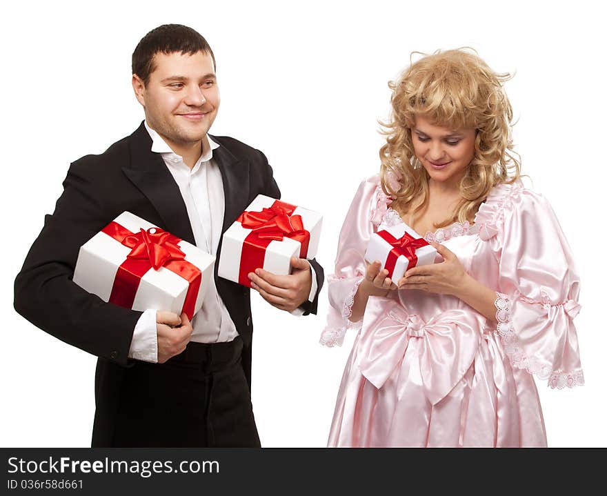 Victorian couple with gift boxes. Isolated over white background