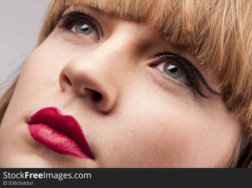 Close-up of female face. Bright make-up