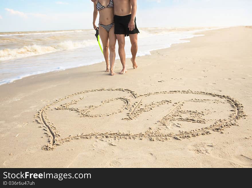 Hearts drawn on the sand