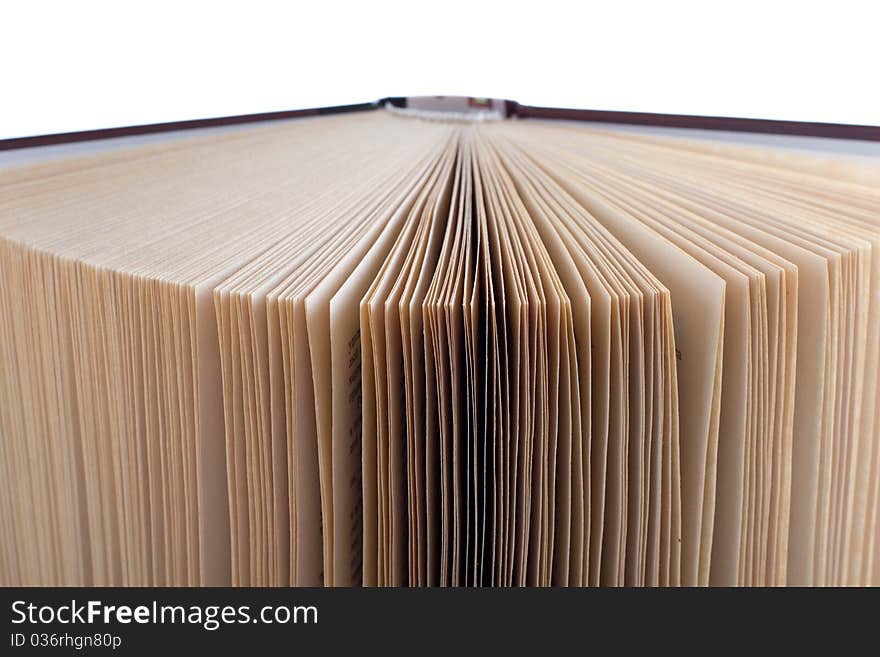 Open old book on white background. Isolated.