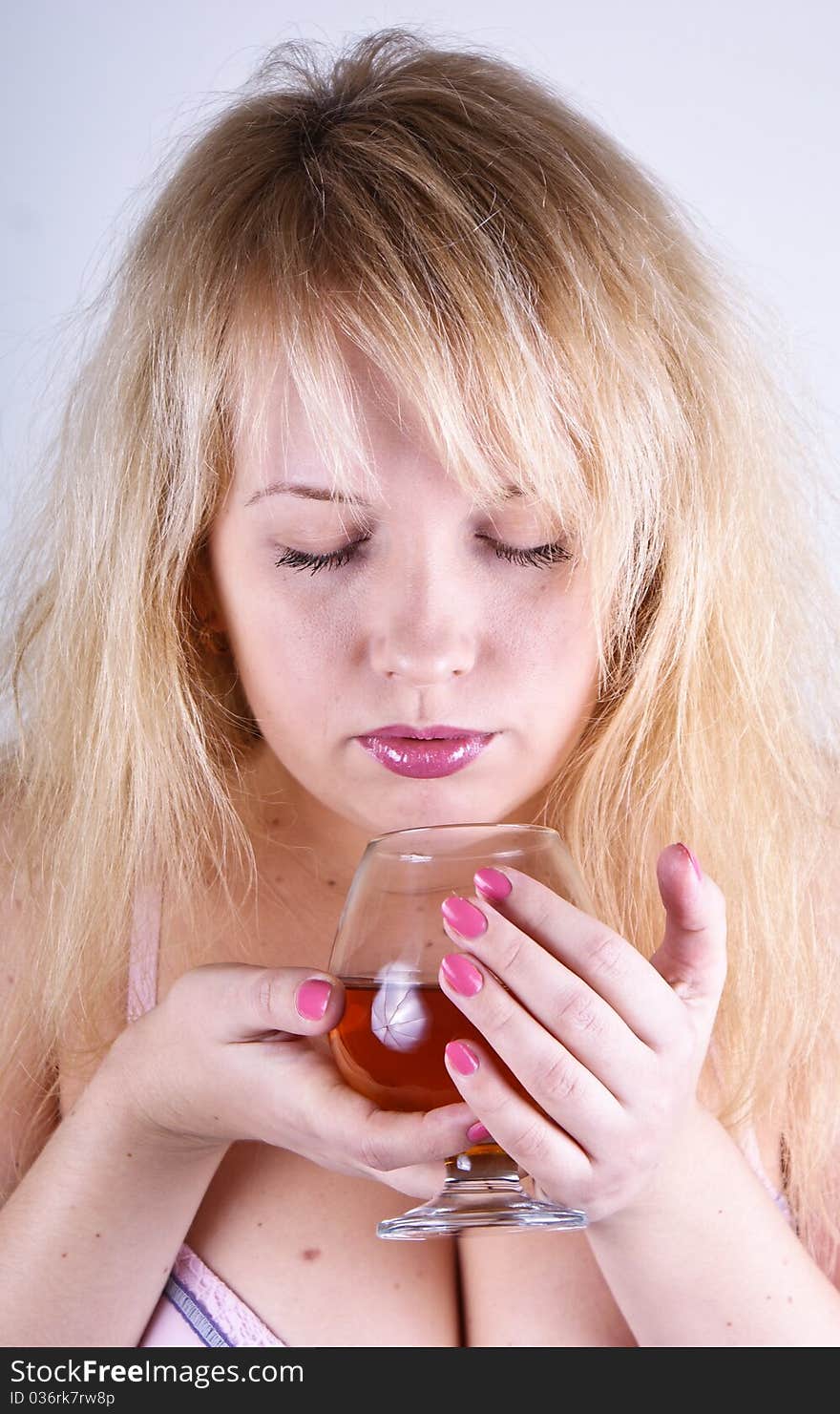 Girl with glass of cognac. Girl with glass of cognac