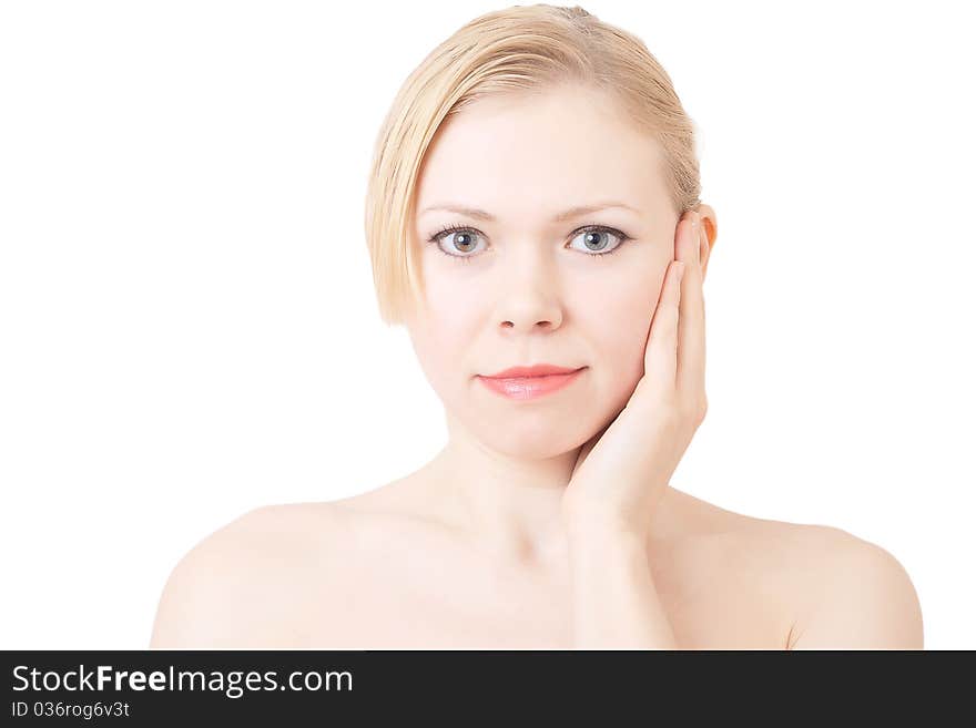 Portrait of the beautiful young woman which has brought the hand to a cheek. Portrait of the beautiful young woman which has brought the hand to a cheek