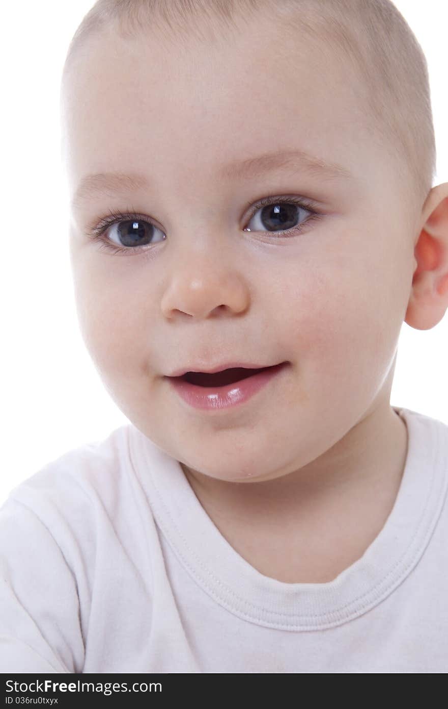 Bright closeup portrait of adorable baby over white