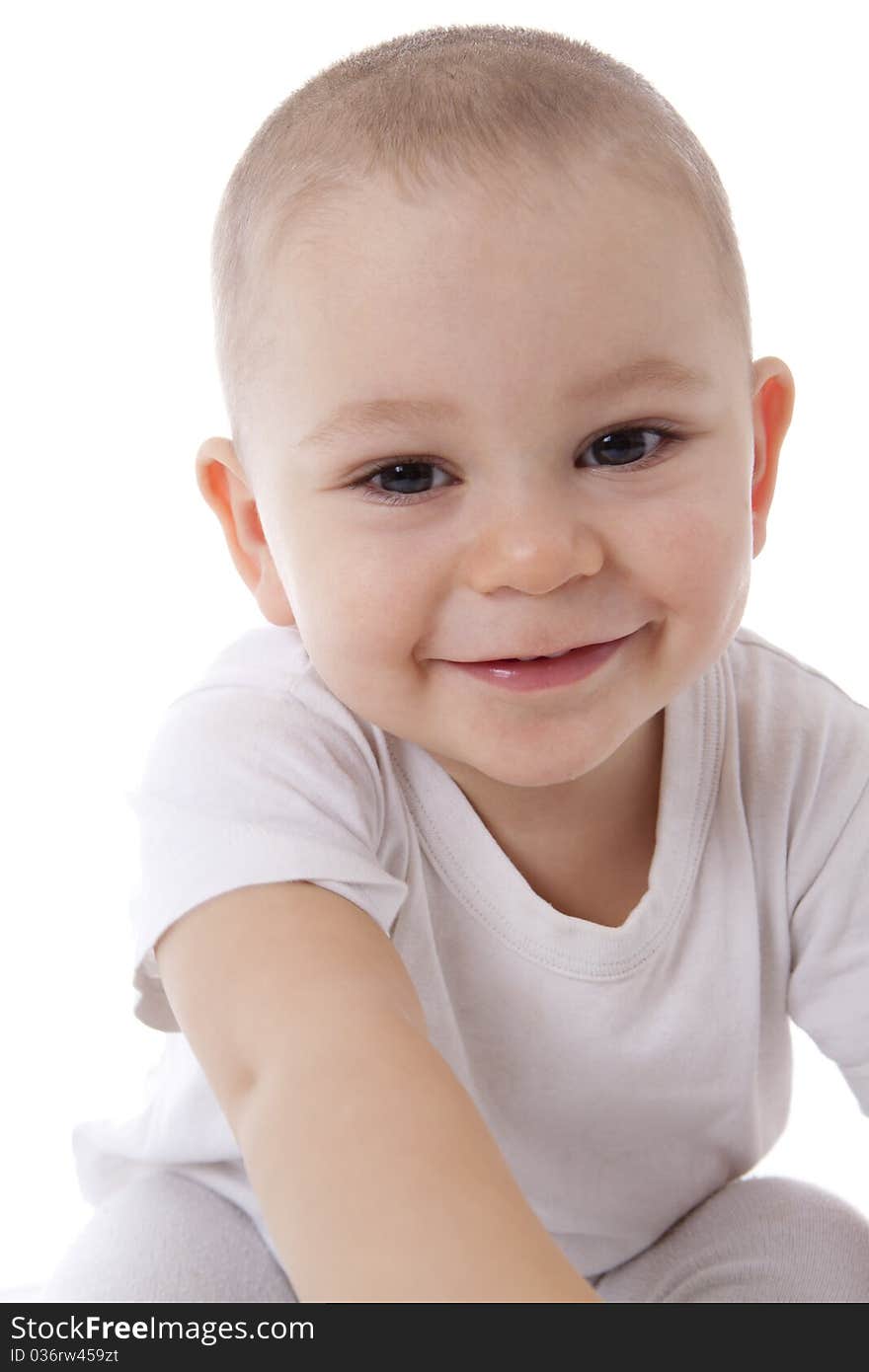 Bright closeup portrait of adorable baby over white