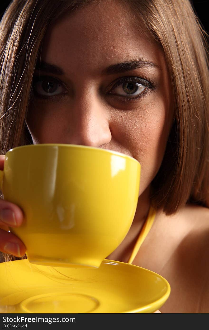 Close Up Of Beautiful Woman Drinking Cup Of Tea