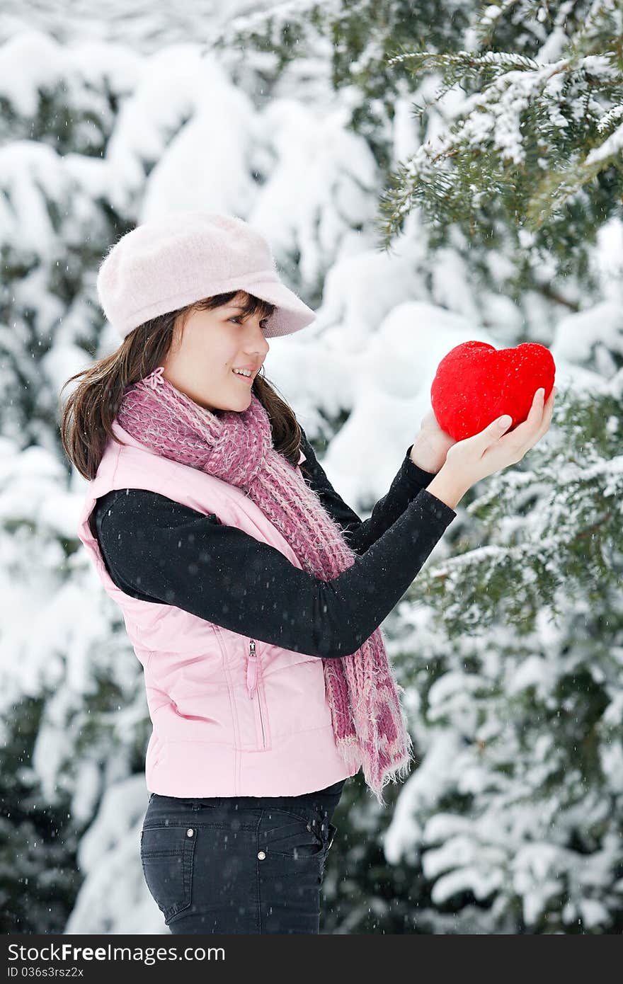 Teen girl heart in his hands