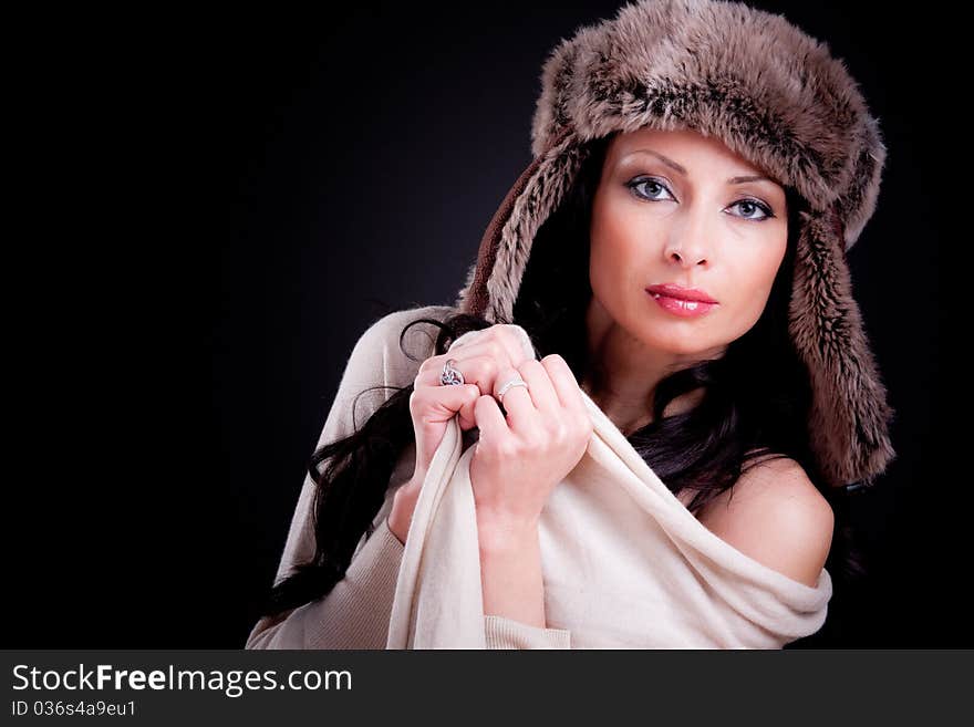 Attractive girl in winter fur hat