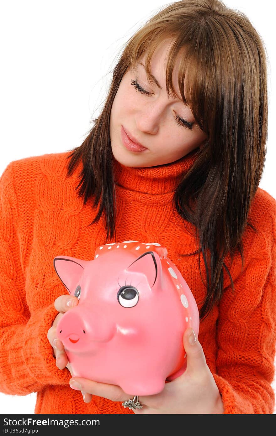 Young Woman Standing With Piggy Bank