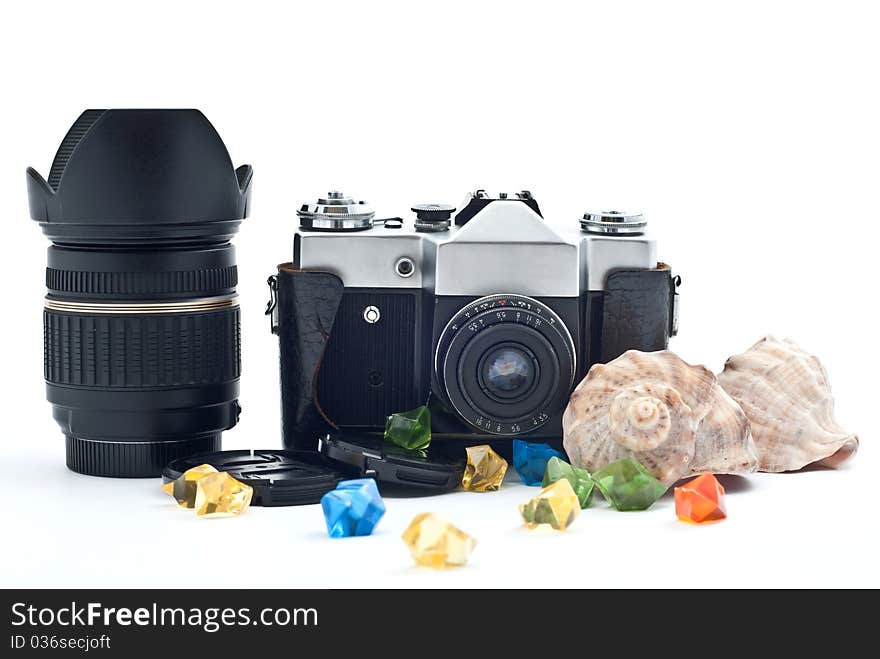 Black retro analog camera with lens. Isolated on white