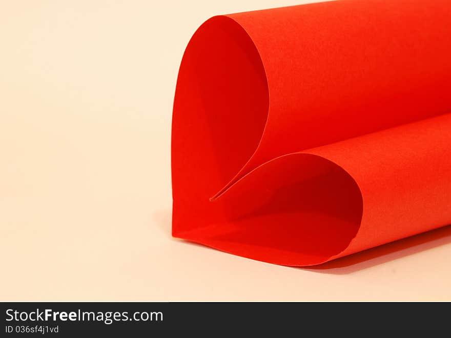 A red paper on a white background. A red paper on a white background