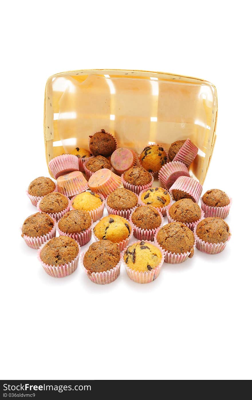 Mini cupcakes with cocoa and chocolate chips and wooden box isolated on a white background