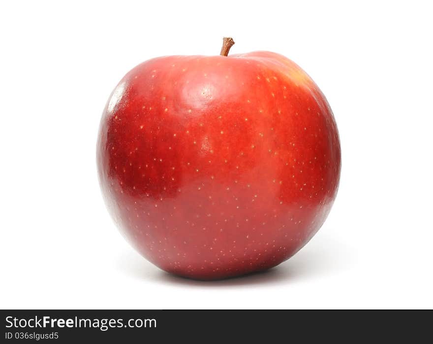 A shiny red apple isolated on a white background