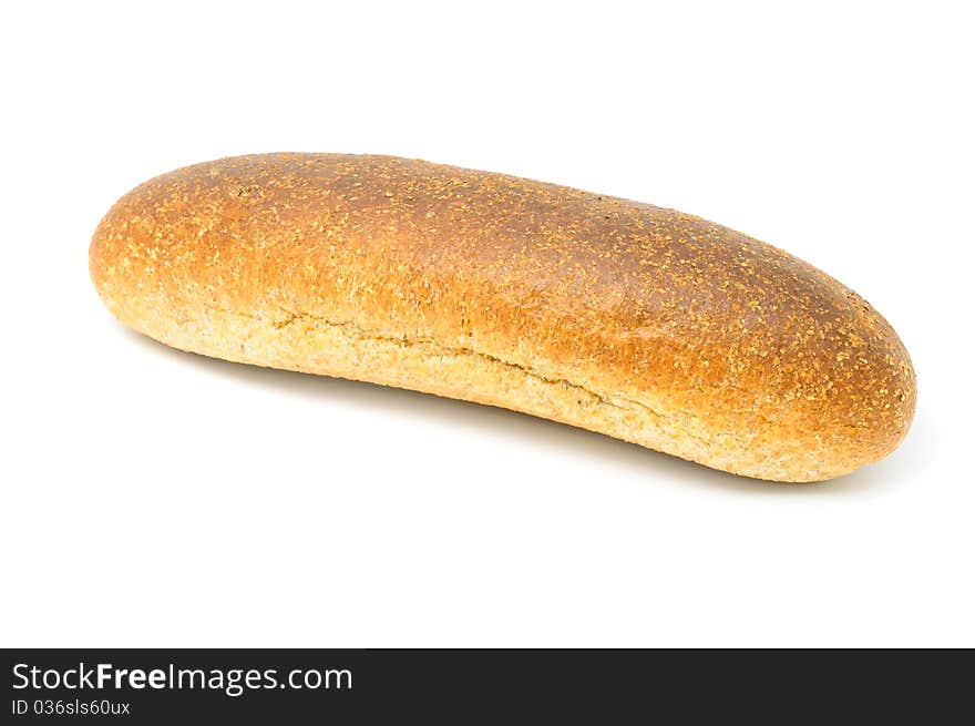 A loaf of bran bread isolated on a white background