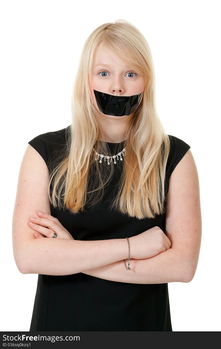 Beautiful girl with her mouth sealed with black tape