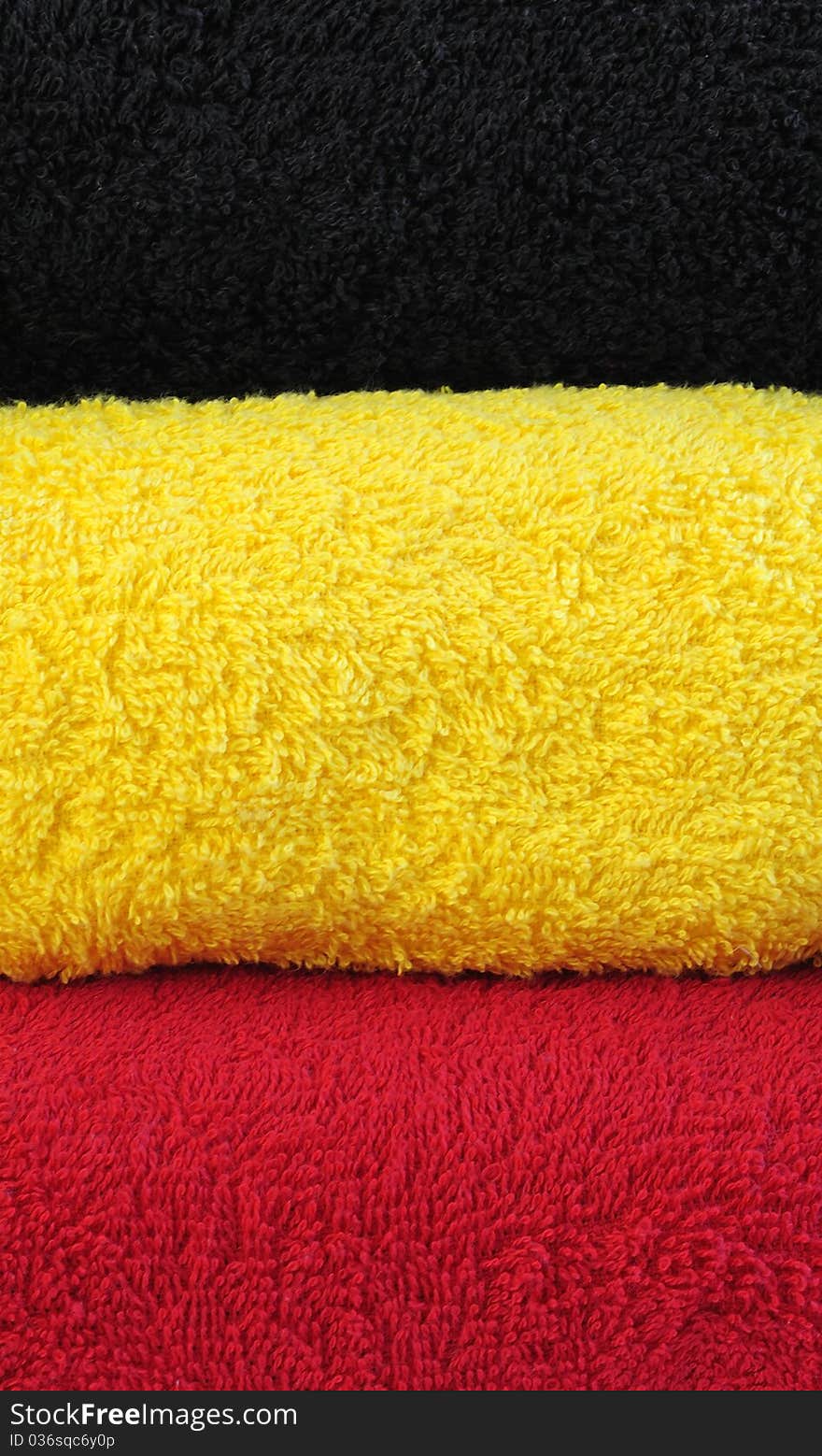 Three color background made from rolled towels. Three color background made from rolled towels