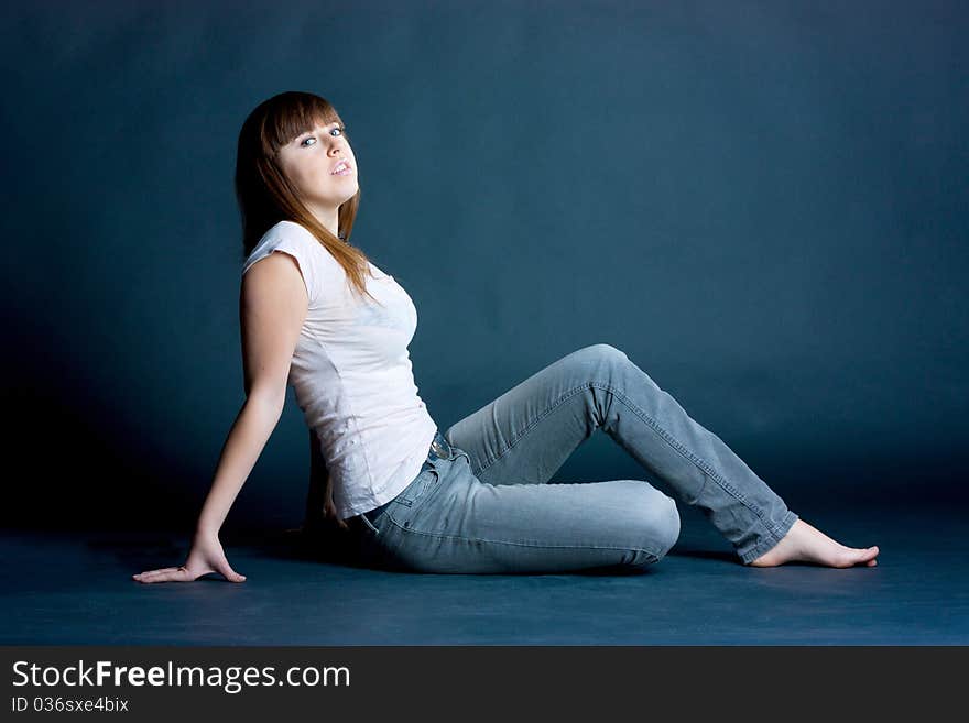 Portrait of a girl on a dark background. Portrait of a girl on a dark background