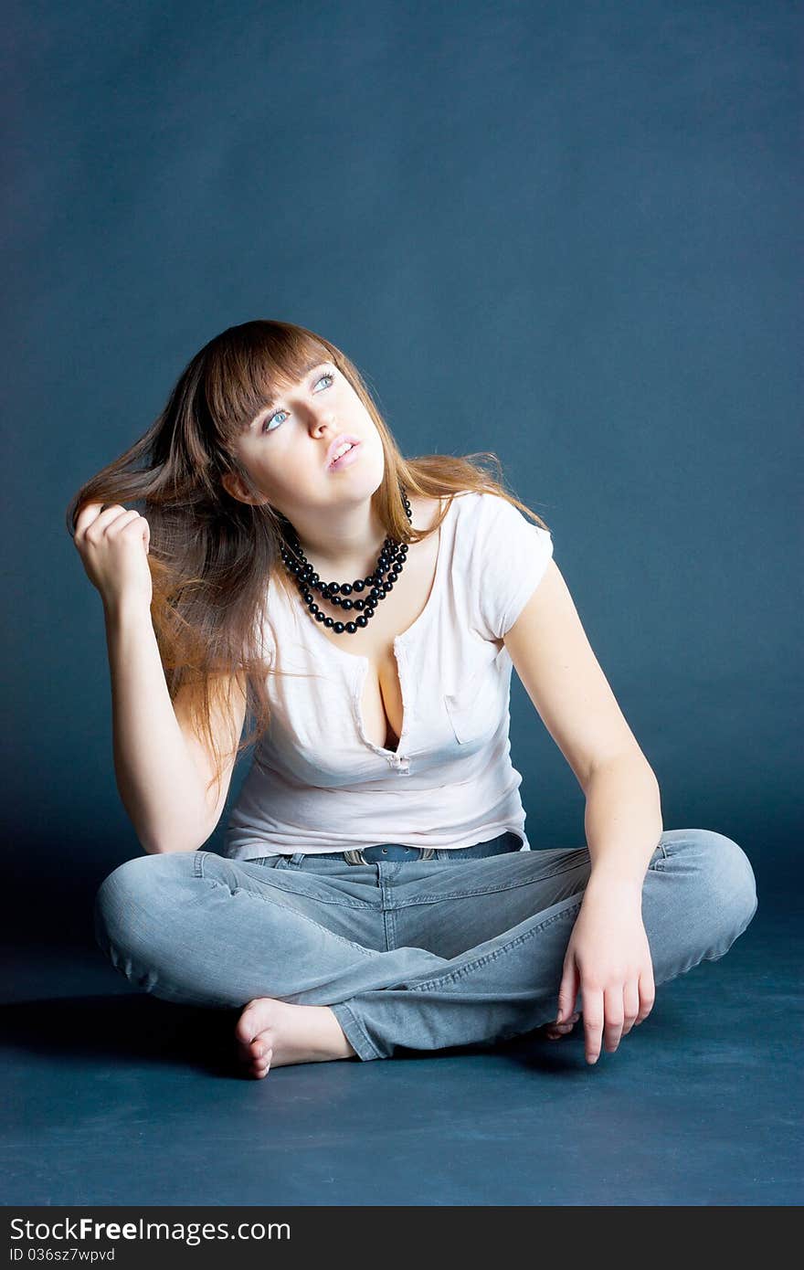 Portrait of a girl on a dark background. Portrait of a girl on a dark background