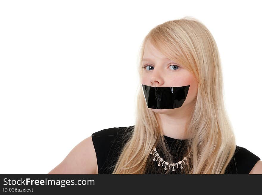 Beautiful girl with her mouth sealed with black tape