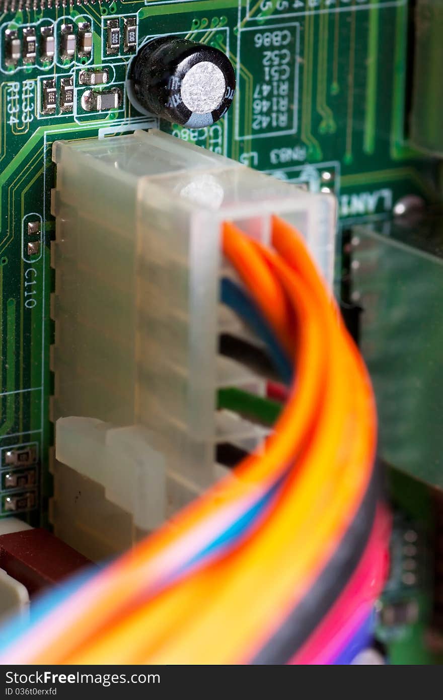 Macro view of electronic circuit board with connected power wires. Macro view of electronic circuit board with connected power wires