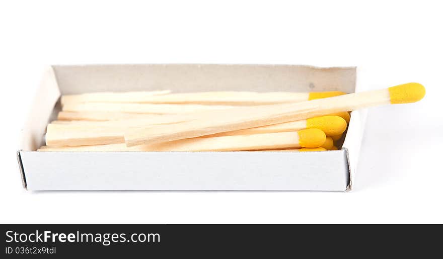 Open boxes of wooden matches and yellow-head