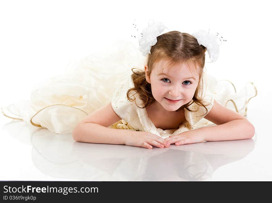 Beautiful girl in a bridal dress isolated on white. Beautiful girl in a bridal dress isolated on white