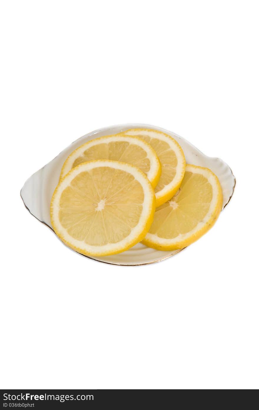 Lemons on a plate, isolated